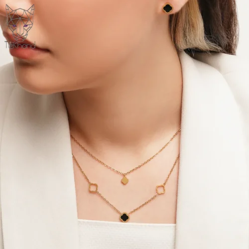black halfset vancleef gold